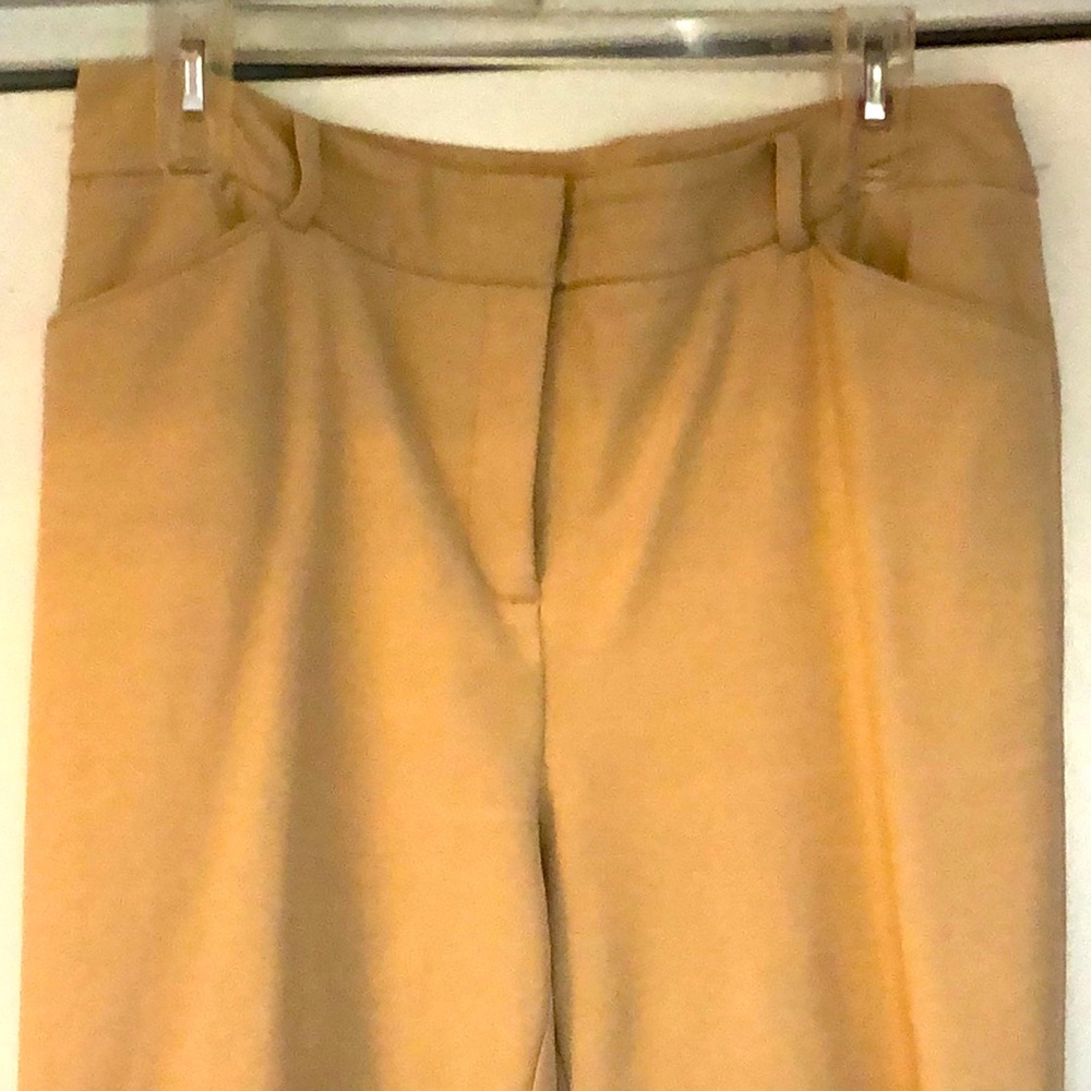 Chico’s beige 5 pocket zip front trousers. Size 8. Flare leg. Good condition